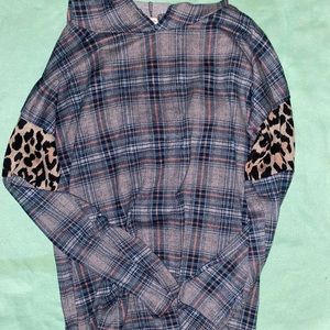 Long sleeve pattern shirt with a hood